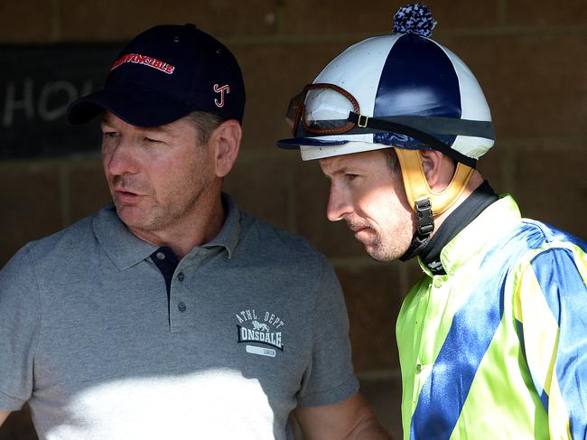 Kris Lees and Hugh Bowman talk about Lucia Valentina's Newcastle barrier trial . Picture by Peter Lorimer.