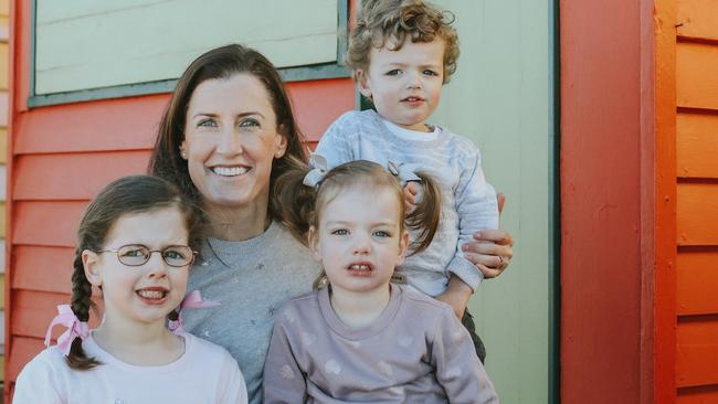 Australian Olympic aerial skier and five-time world title winner, Jacqui Cooper, with children Madeline (left), Grace and Thomas.