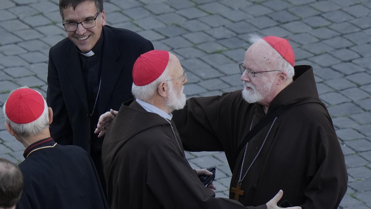 Cardinal Sean Patrick O'Malley, right, hugs Cardinal Celestino Braco in St Peter's Square after white smoke billowed from the chimney of the Sistine Chapel. (AP Photo/Luca Bruno)