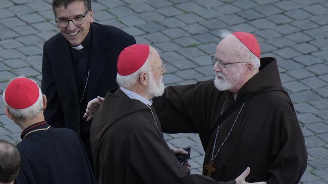 Cardinal Sean Patrick O'Malley, right, hugs Cardinal Celestino Braco in St Peter's Square after white smoke billowed from the chimney of the Sistine Chapel. (AP Photo/Luca Bruno)