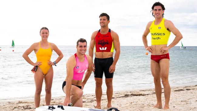 Seacliff Surf Life Saving Club members Taylor Nixon-O’Brien, Nathaniel Drummond, Tom May and Angus Higgins on the beach in Adelaide. Picture: Morgan Sette