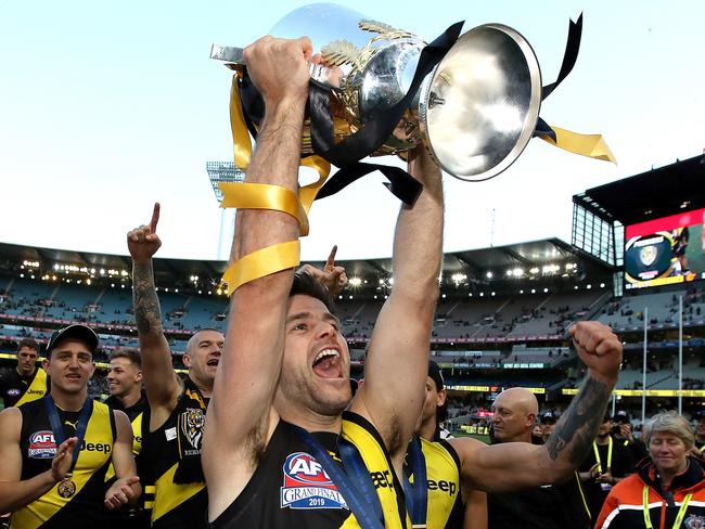 Richmond's Trent Cotchin leaves the field with the Premiership Cup after the Tigers defeated the GWS Giants in the 2019 AFL Grand Final at the MCG. picture. Phil Hillyard