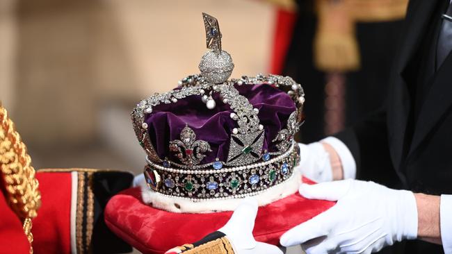 The Imperial State Crown arrives through the Sovereign's Entrance ahead of the State Opening of Parliament in the House of Lords in May. Picture: Getty Images