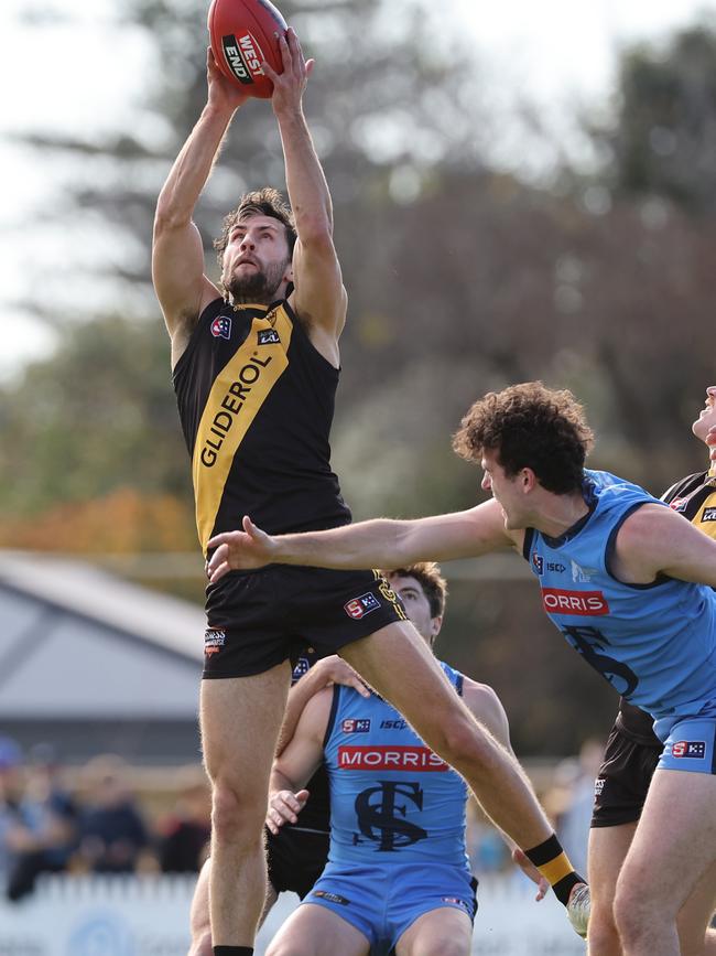 Glenelg’s Max Proud marks strongly against Sturt in Round 9. Picture: David Mariuz/SANFL