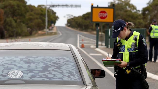 SA police at the border, which was closed in late March. Picture: AAP / Kelly Barnes