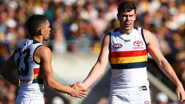 Mitch McGovern and Charlie Cameron react to a goal. Picture: Getty Images