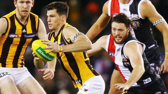 Jaeger O'Meara slips away from Jack Steven.