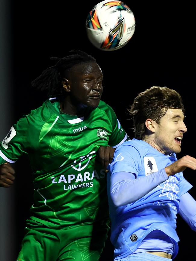 Ajak Riak of Bentleigh Greens (L) and Max Burgess of Sydney FC compete for the ball. Picture: Graham Denholm/Getty Images