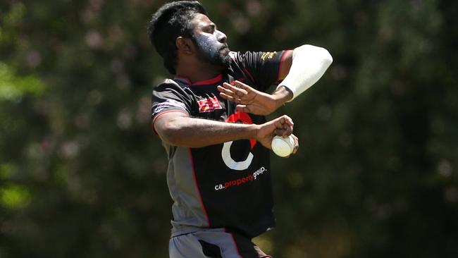 Mohomed Feshal in action for West Coburg. Picture: Hamish Blair