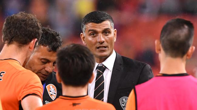 Roar coach John Aloisi has tough decisions to make balancing campaigns on two fronts.