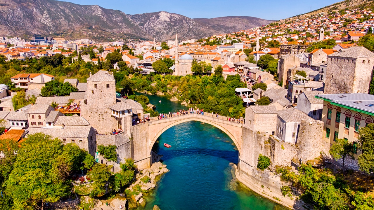 <h2>Bosnia and Herzegovina</h2><p>Whether it&rsquo;s due to its complex history and the aftermath of its 1990s civil war, or the fact it&rsquo;s less marketed than neighbouring Croatia, Bosnia and Herzegovina (or just plain Bosnia between friends), still largely falls under the radar for many travellers. To overlook it would be a mistake, for more so than any other Balkan country, Bosnia is celebrated for its East meets West culture informed by centuries of Ottoman rule, as well as Austro-Hungarian history. Add to that a landscape of staggering mountain scenery, raftable rivers, low-cost ski resorts and more medieval castle ruins than you ever deemed possible, and you have a crowd-free destination that ticks every box.</p><p>Sarajevo, considered the &ldquo;Jerusalem of Europe&rdquo; with its melting pot of cultures, is equal parts fascinating and heartbreaking. Intersperse visits to the likes of the old bazaar of Ba&scaron;&#269;ar&scaron;ija and 14th-century Gazi Husrev-beg Mosque with stops at the Sarajevo War Tunnel and Gallery 11/07/95, a space dedicated to preserving the memory of the Srebrenica genocide.</p><p>Half an hour away, the town of Visoko is enjoying a new wave of tourism thanks to its Bosnian pyramids (a series of pointy hills), while quaint Medjugorje is a popular pilgrimage site for Catholics due to a series of reported apparitions of the Virgin Mary.</p>