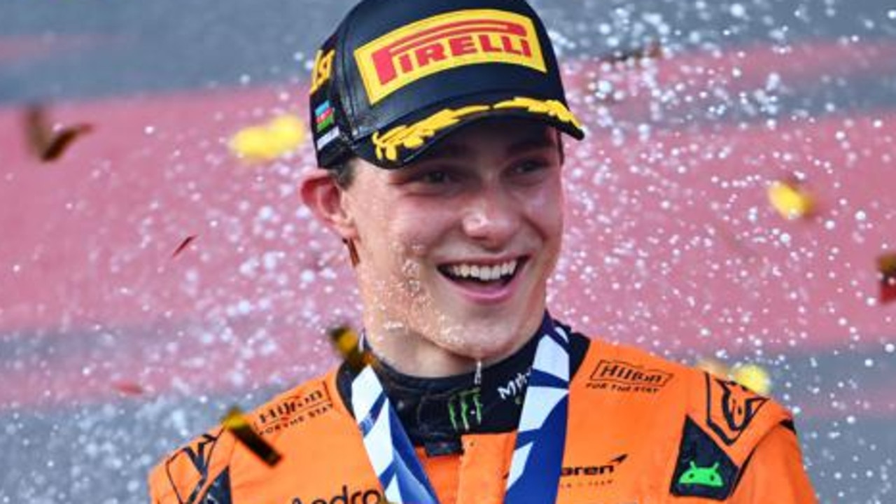 BAKU, AZERBAIJAN - SEPTEMBER 15: Race winner Oscar Piastri of Australia and McLaren celebrates on the podium during the F1 Grand Prix of Azerbaijan at Baku City Circuit on September 15, 2024 in Baku, Azerbaijan. (Photo by Dan Mullan/Getty Images)