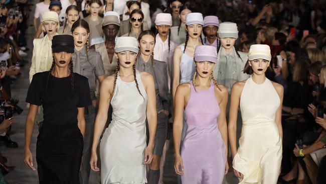 Women in uniform … models show off the Max Mara Spring 2020 collection in Milan. Picture: AP