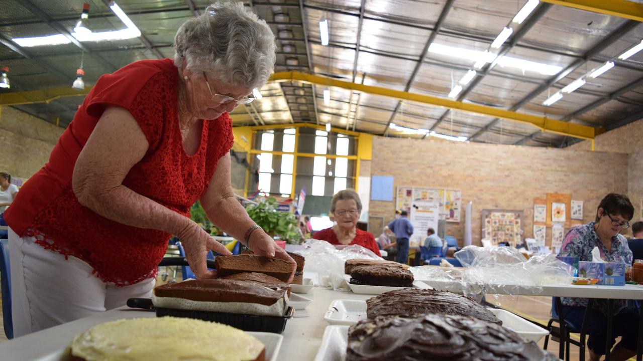 Mary Hamblin preparing chocolate cake for judging at the 2019 Allora Show. Unfortunately the cooking sections will not be going ahead this year due to additional COVID-Safe rules.