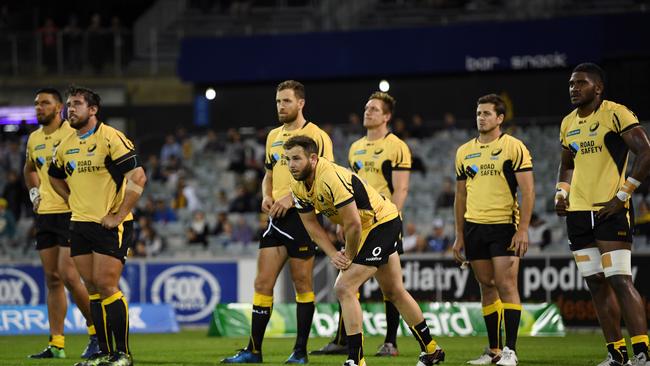 Force players react after losing a match at GIO Stadium in Canberra.