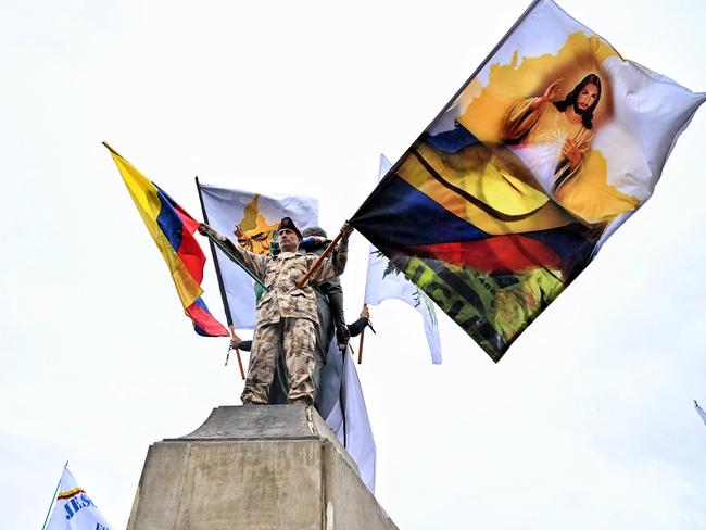 Former members of the Colombian Military Forces take part in a demonstration against Colombian President Gustavo Petro outside the National Congress in Bogota. Picture: Juan Barreto / AFP