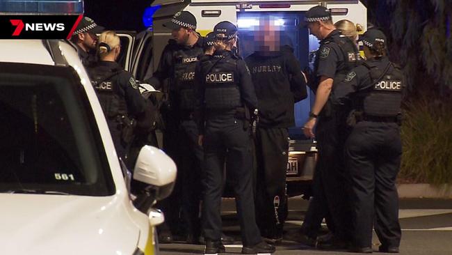 A man is arrested outside the McDonald’s after the alleged bomb hoax. Picture: 7NEWS Adelaide