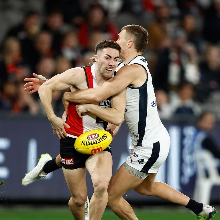 Jade Gresham of the Saints is tackled by Patrick Cripps of the Blues during the 2023 AFL Round 21 match between the St Kilda Saints and the Carlton Blues at Marvel Stadium. Picture: Getty Images