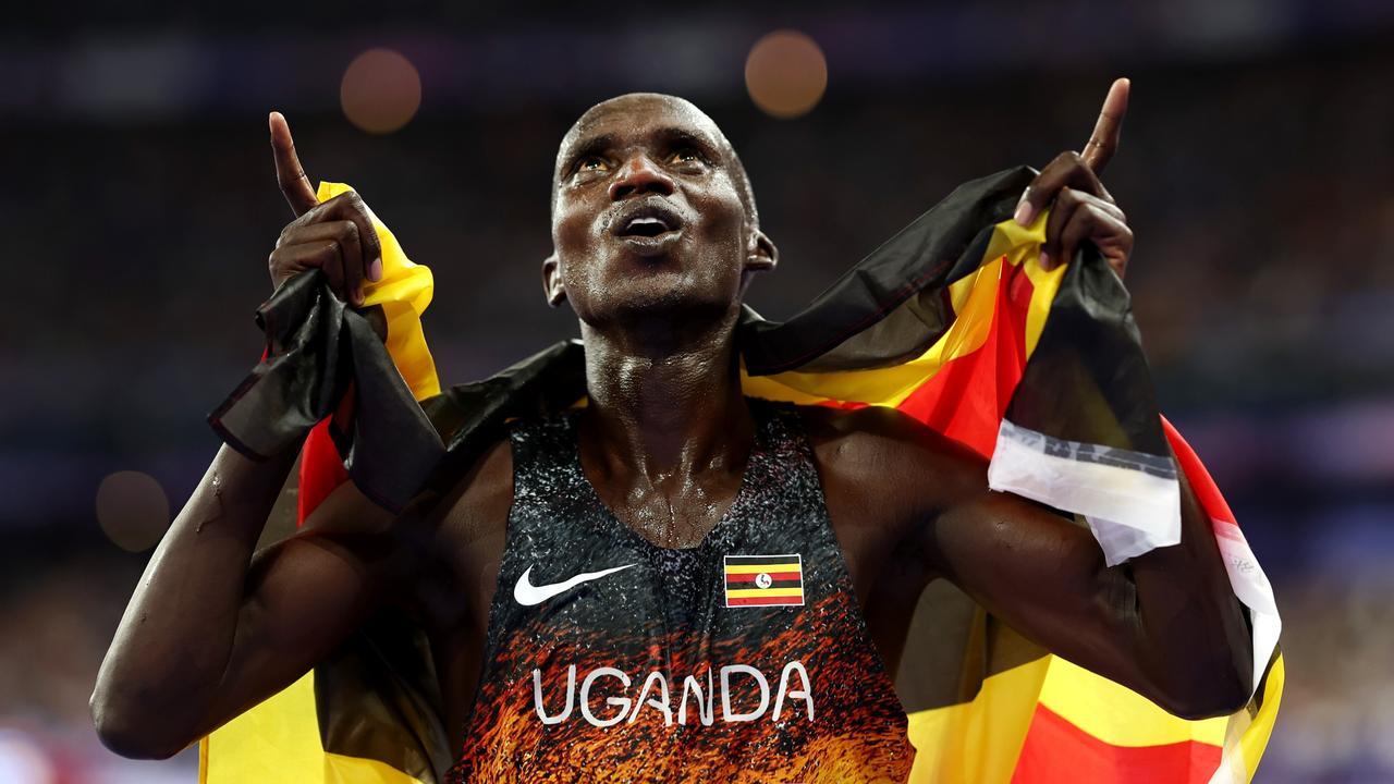 Gold medalist Joshua Cheptegei of Team Uganda. Photo by Cameron Spencer/Getty Images