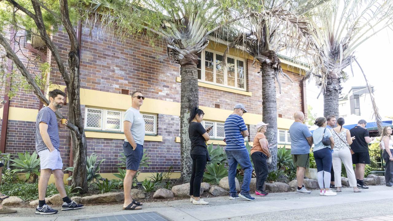 Early voters line up at Morningside State School. Picture: Richard Walker