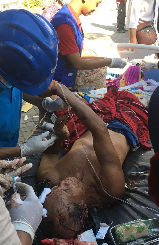 A man receives medical attention after getting injured in the earthquake. Picture: Supplied