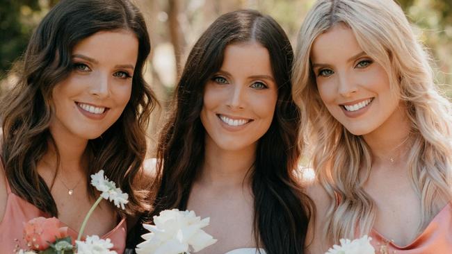 When identical triplet Kate Taeuber married recently, it was only fitting her sisters Amy and Sophie would each be a maid of honour. Picture: Meaghan Coles