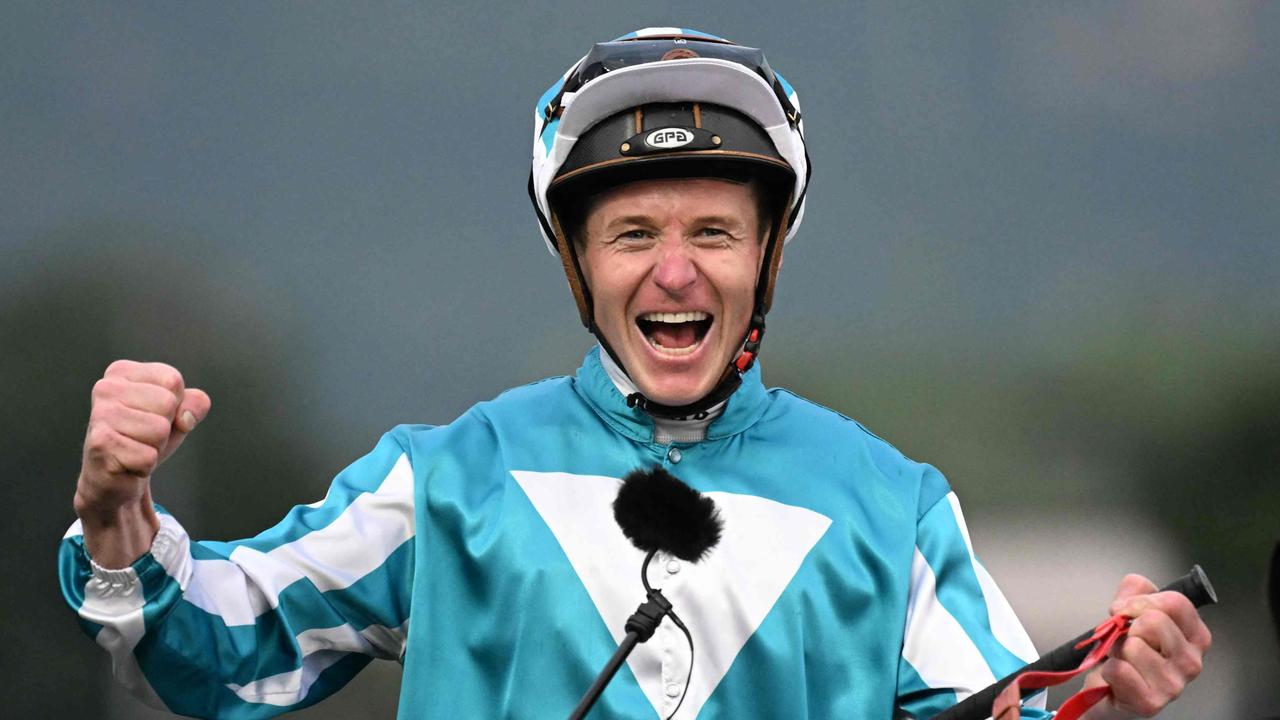 James McDonald celebrates winning the Group 1 Hong Kong Cup aboard Romantic Warrior on December 10. Picture: Peter Parks / AFP