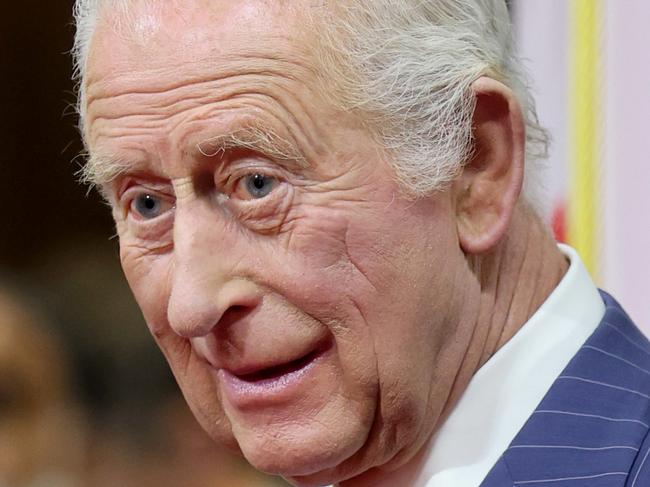 OTTAWA, ONTARIO - MAY 27: King Charles III smiles as he stands in the Senate Chamber for the State Opening of Parliament during an official visit to Canada on May 27, 2025 in Ottawa, Ontario. It is The King's 20th and Queen's 5th tour of Canada, with their previous visit being in 2022. (Photo by Chris Jackson - Pool/Getty Images)