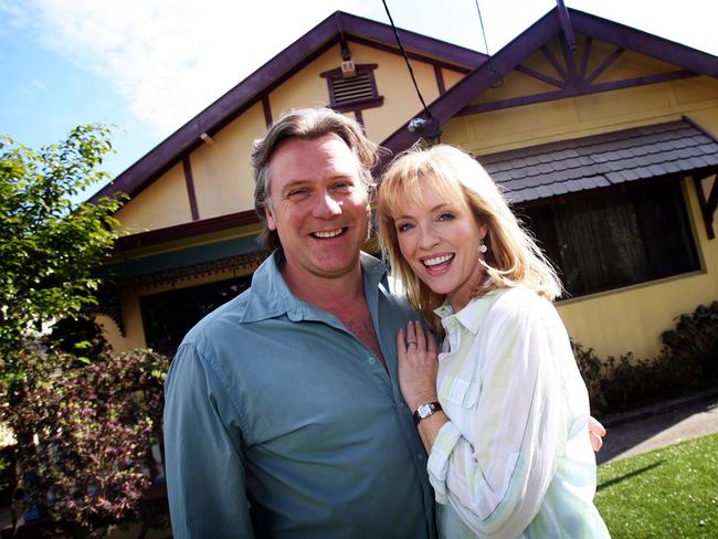 Actors Erik Thomson and Rebecca Gibney outside 8 Riverview Street in Concord, where Packed To The Rafters was filmed.