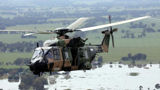 An Australian Army MRH90 Taipan helicopter from 6th Aviation Regiment conducts reconnaissance at Shepparton, Victoria, as part of Operation Flood Assist 2022. *** Local Caption *** Australian Army personnel from 6th Aviation Regiment provided assistance to flood-affected communities in Victoria as part of Operation Flood Assist 2022.  Defence established Operation Flood Assist 2022 on 17 October 2022 as part of the whole-of-government response to flooding in Victoria and New South Wales. Defence personnel, equipment, high-clearance vehicles and helicopters are supporting emergency authorities in assisting affected communities. Broadly, support includes flood preparation activities such sand bagging, welfare checks, evacuation support, transport, logistics resupply, access assistance and initial recovery support.   The Australian Defence Force remains postured to provide additional support to State Emergency Services should a request be received via National Emergency Management Australia.