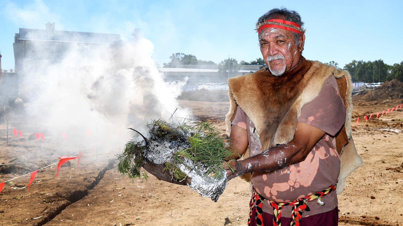 Uncle Alfred Smallwood blesses the site with a smoking ceremony to mark the start of construction on the JCU Technology Innovation Complex (TIC). Picture: Shae Beplate.