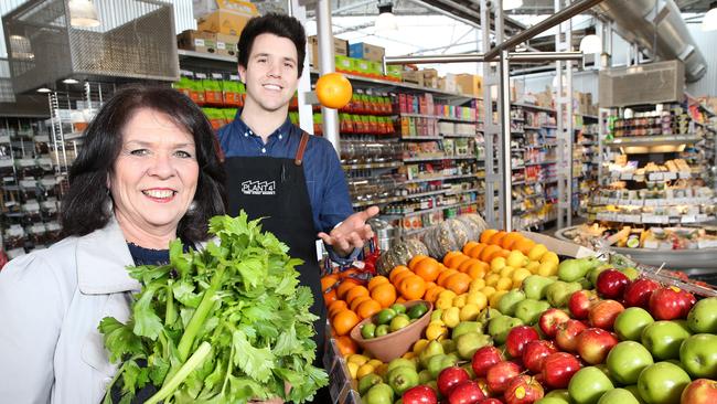 Marilyn Kaitatzis and her son Jono Kaitatzis in the family’s store at Bowden. The Kaitatzis family own IGA City Central, Market Shed on Holland and now IGA Bowden and the broader Plant 4 complex in Bowden. Picture: Stephen Laffer.