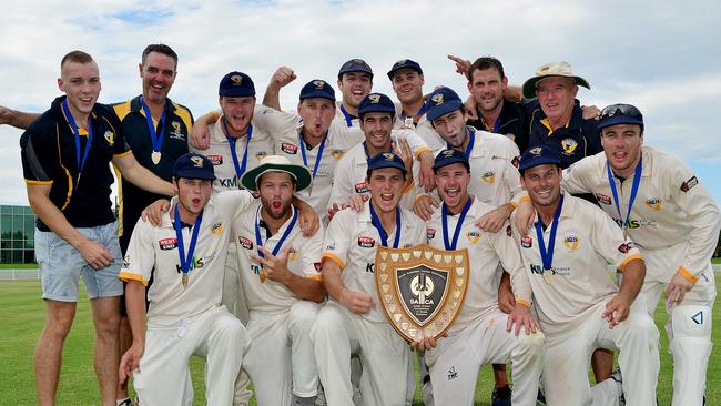 West Torrens players celebrate after winning the Grade Cricket grand final against Kensington, at Woodville Oval on Sunday – its third flag this season. Picture: Bianca De Marchi.