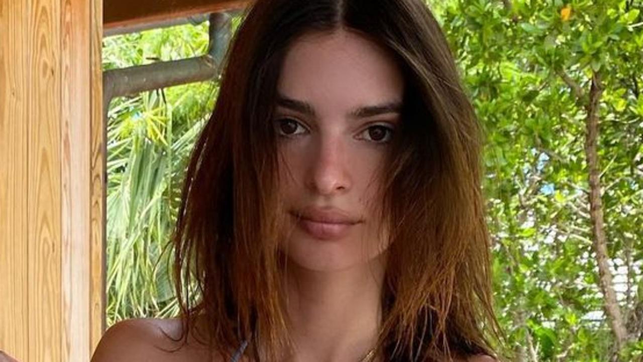 Emily Ratajkowski causes stir with series of bikini photos holding baby