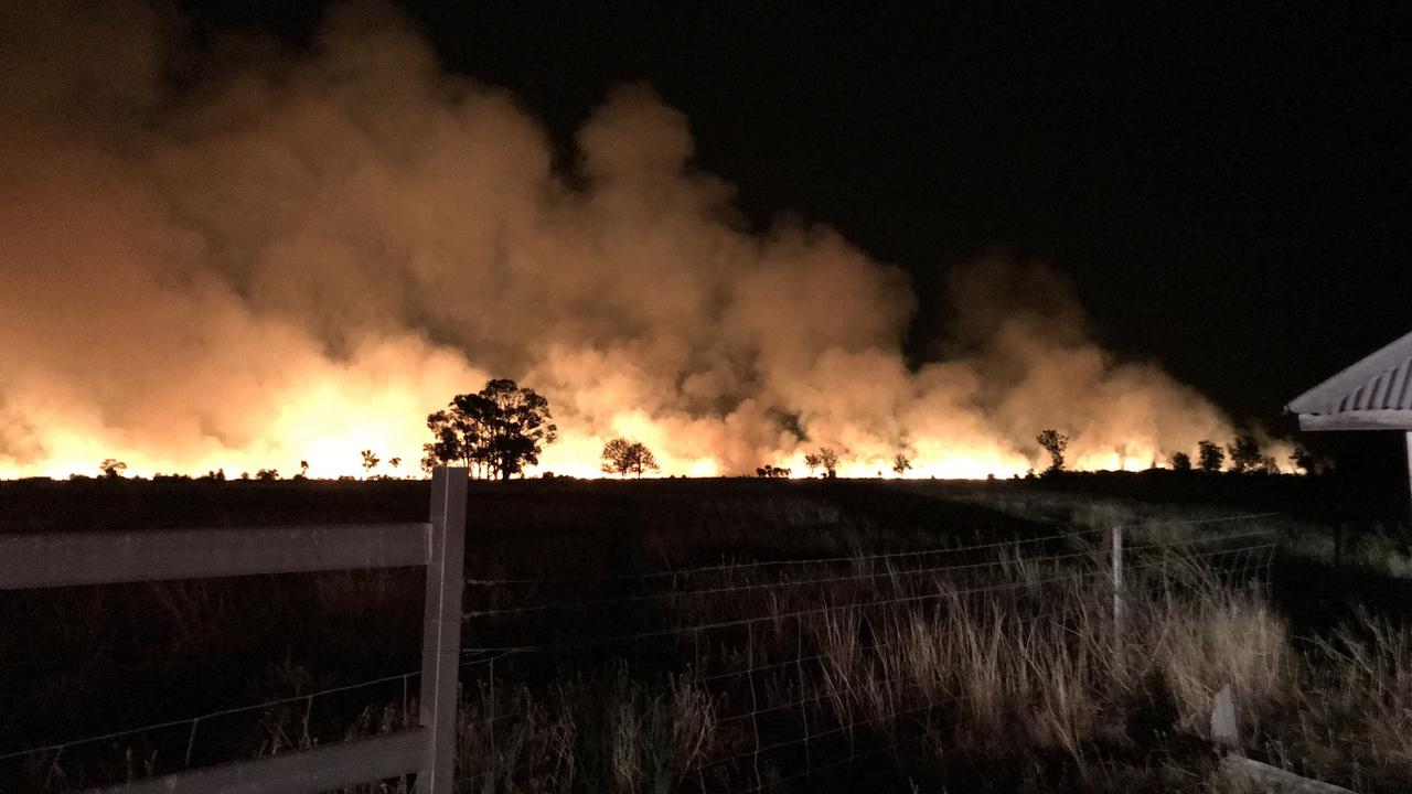 A large scale effort is under way to contain two fast-moving grass fires west of Kogan. One is on Kogan Condamine Road, the other in in Wieambilla.