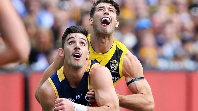 Taylor Walker and Alex Rance battle for the ball. Picture: Mark Stewart