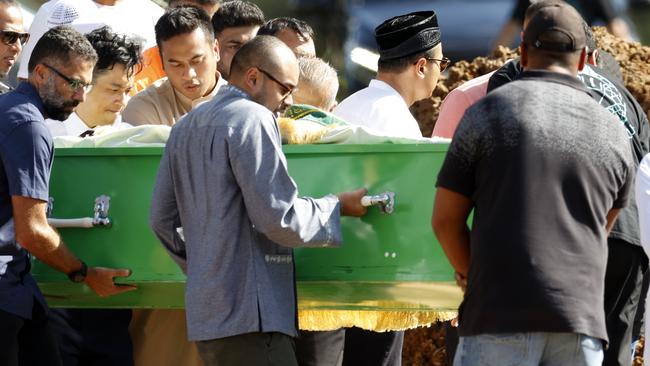 He bravely carried his wife’s coffin today. Picture: Jonathan Ng