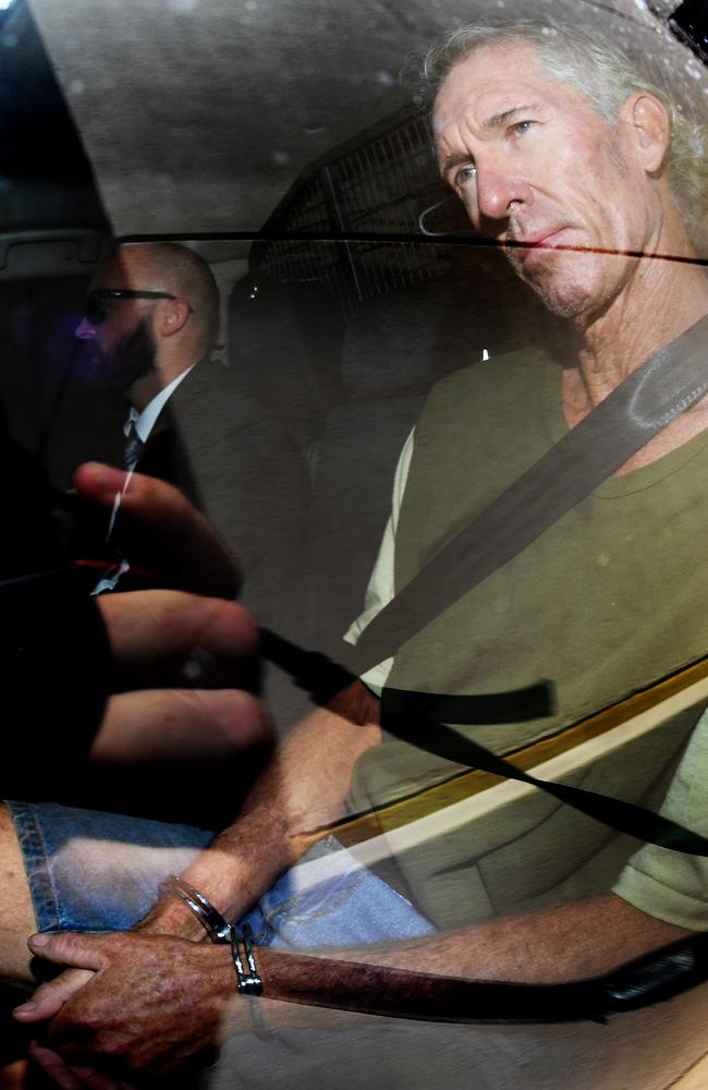 Edward Lord in handcuffs as he taken from the Southport Watchhouse on the Gold Coast in March 2017 to be extradited to Tweed Heads, NSW. Picture: AAP/Dave Hunt