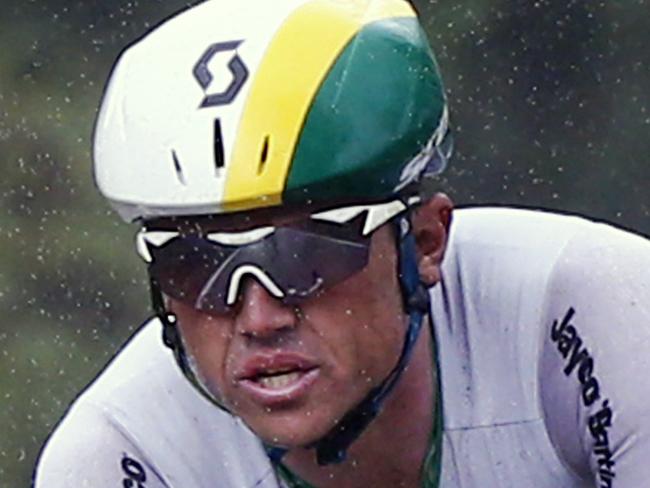 Silver medallist Australia's Simon Gerrans, second left, rides in the pack during the men's road race over 254.8 kilometers (158.3 miles) of the Road Cycling World Championships in Ponferrada, north-western Spain, Sunday Sept. 28, 2014. (AP Photo/Daniel Ochoa de Olza)