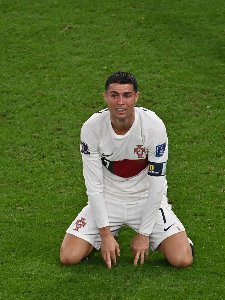 Cristiano Ronaldo reacts after losing to Morocco. Photo by NELSON ALMEIDA / AFP.
