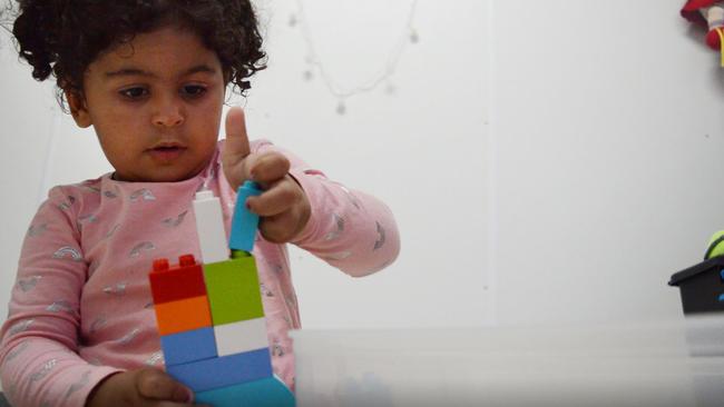 Melanie plays with some blocks. Picture: World Vision Australia