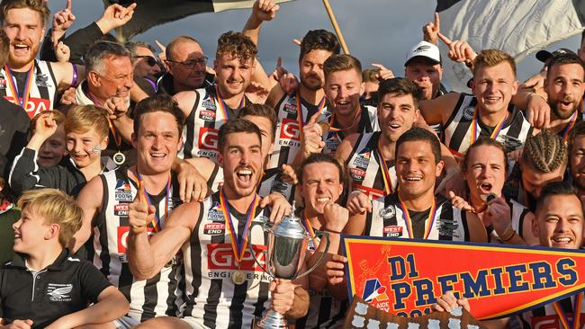 PNU players celebrate their grand final triumph. Picture: Tom Huntley