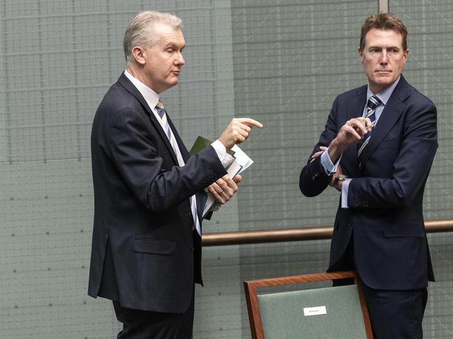 Tony Burke speaking with Christian Porter. Picture: Gary Ramage.