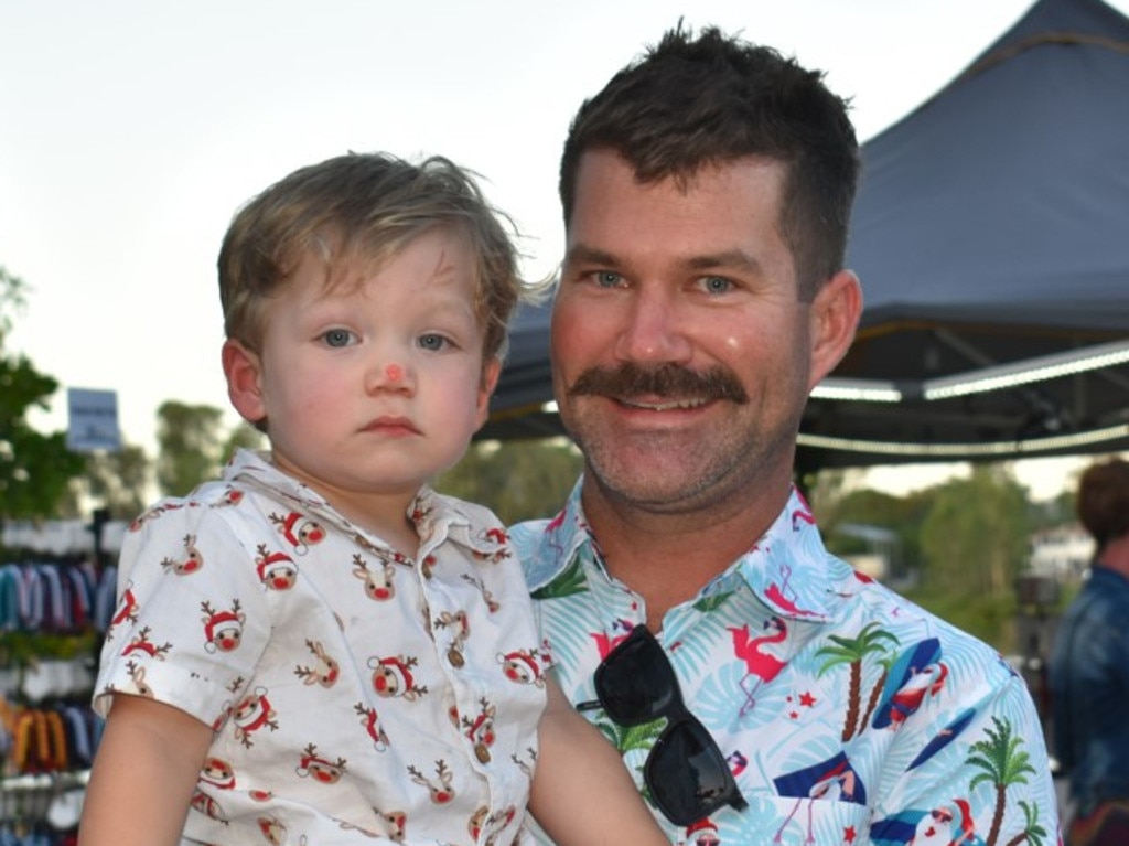 Josh and Cooper Beeson at the CBD Christmas Fair in Rockhampton on December 3, 2022.