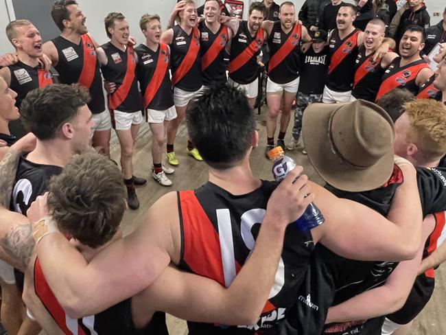 EFL Division 4 2023 footy: Scoresby v Kilsyth. Kilsyth team celebrate their 100 points win. Picture: Valeriu Campan