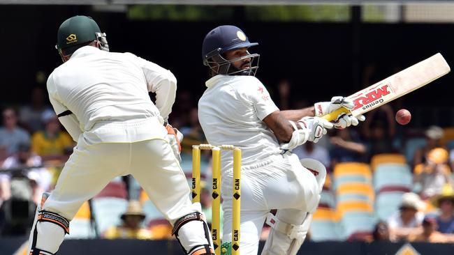 Australia's wicketkeeper Brad Haddin lauds a successful LBW appeal against India's Shikhar Dhawan from off spin bowler Nathan Lyon.