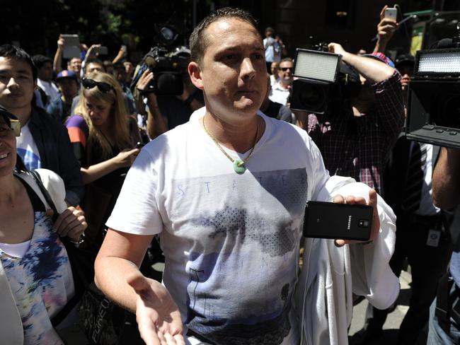 A man yells out anti-Islamic statements during the siege at Martin Place. Photo: Chris McKeen