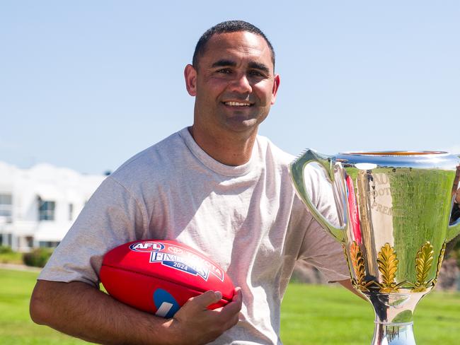 Shaun Burgoyne welcomed the AFL Premiership Cup in Darwin on its national tour ahead of the 2024 Grand Final. Picture: Jono Laird