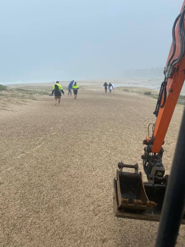 Mr Weber took his excavator onto the sand.