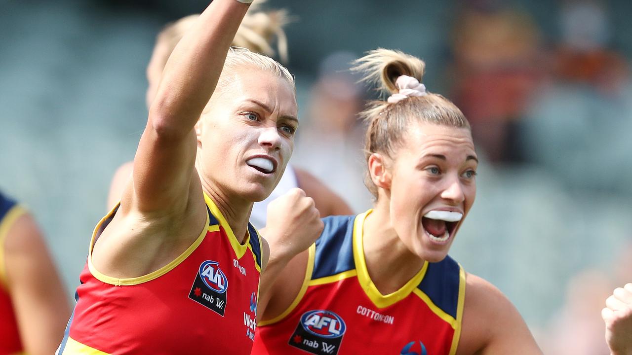 Erin Phillips celebrates a goal with Caitlin Gould in the background during the 2022 AFL Round 03 match between the Adelaide Crows and the Port Adelaide Power at Adelaide Oval. Picture: Sarah Reed/AFL Photos via Getty Images